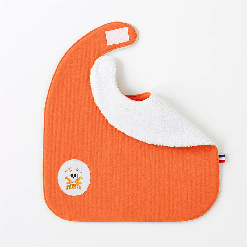 Vendbar økologisk hagesmæk i bomuld – blød frotté og musselin, fremstillet i Frankrig