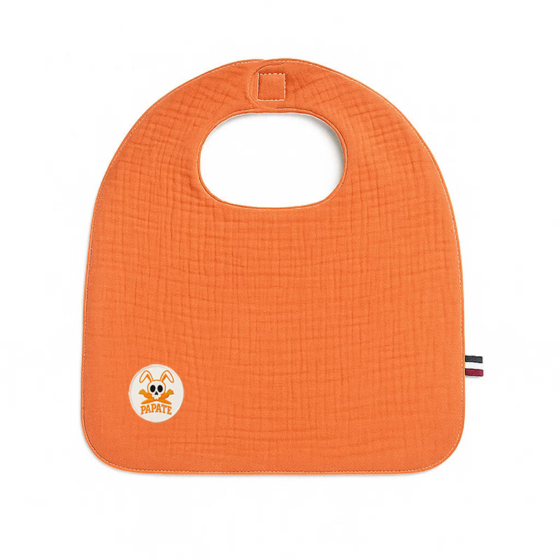 Vendbar økologisk hagesmæk i bomuld – blød frotté og musselin, fremstillet i Frankrig